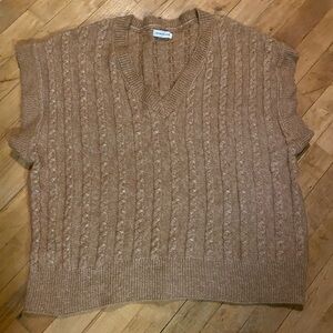 Cupcakes and cashmere vest